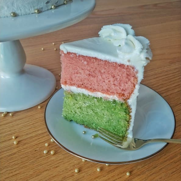 Cake slice colored in pink and light green.