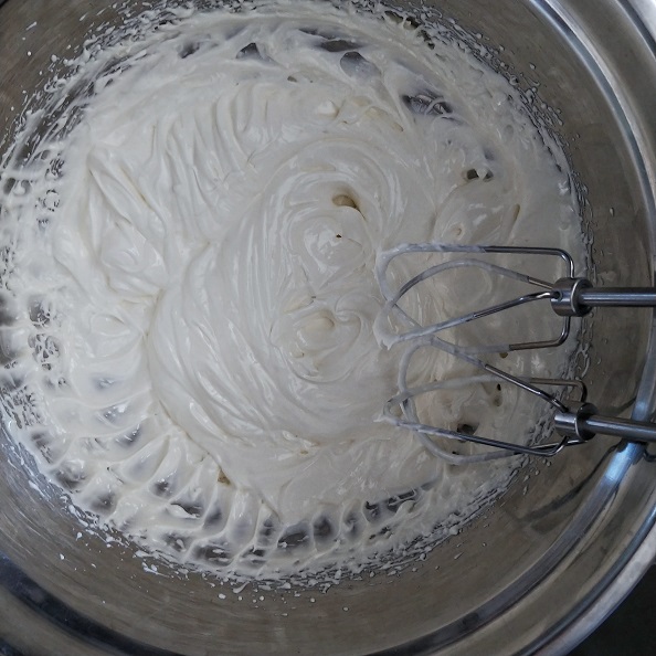 Becel margarine whipped using a handheld beater.