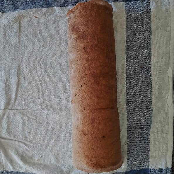Chocolate sheet cake rolled up.